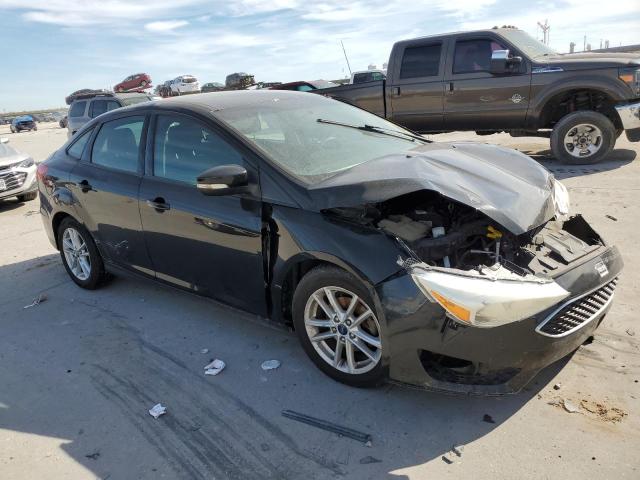 1FADP3F28GL376497 - 2016 FORD FOCUS SE BLACK photo 4