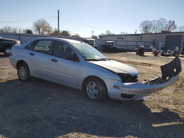 1FAFP34NX7W190027 - 2007 FORD FOCUS ZX4 SILVER photo 4