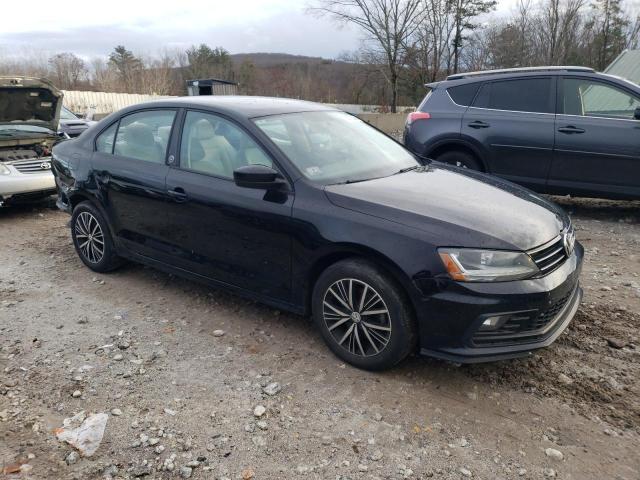 3VWDB7AJ0JM240186 - 2018 VOLKSWAGEN JETTA SE BLACK photo 4