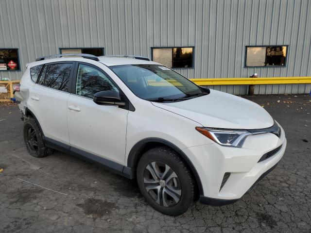 2T3BFREV1HW690641 - 2017 TOYOTA RAV4 LE WHITE photo 4