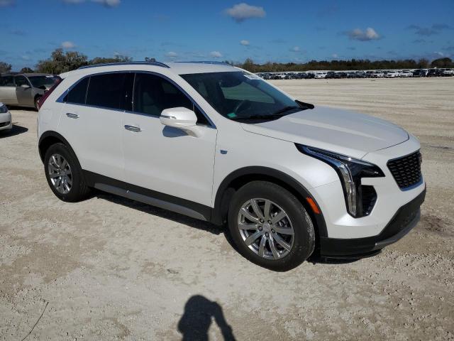 1GYFZCR43PF176551 - 2023 CADILLAC XT4 PREMIUM LUXURY WHITE photo 4