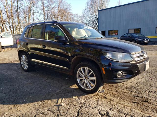 WVGBV7AX0CW603042 - 2012 VOLKSWAGEN TIGUAN S BLACK photo 4