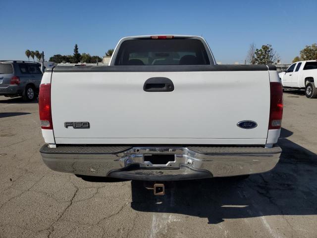 1FTDF17WXWNA08702 - 1998 FORD F150 WHITE photo 6