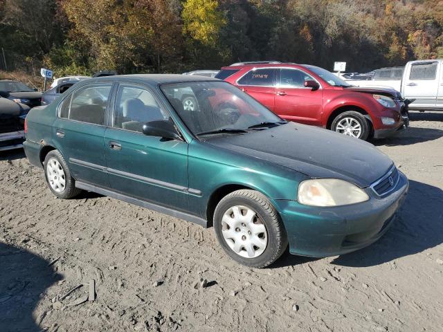 1HGEJ6623XL002365 - 1999 HONDA CIVIC DX GREEN photo 4