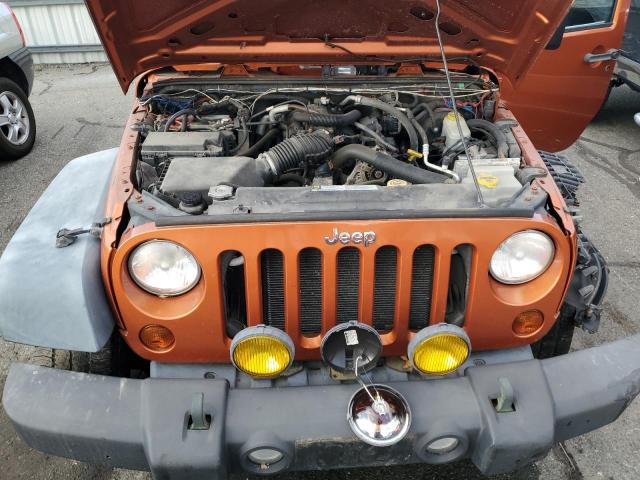 1J4HA3H13AL216949 - 2010 JEEP WRANGLER U SPORT ORANGE photo 12