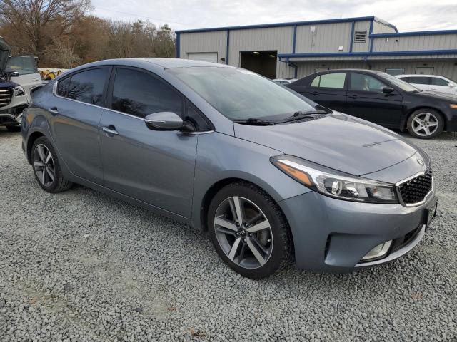 3KPFN4A80HE004897 - 2017 KIA FORTE EX GRAY photo 4