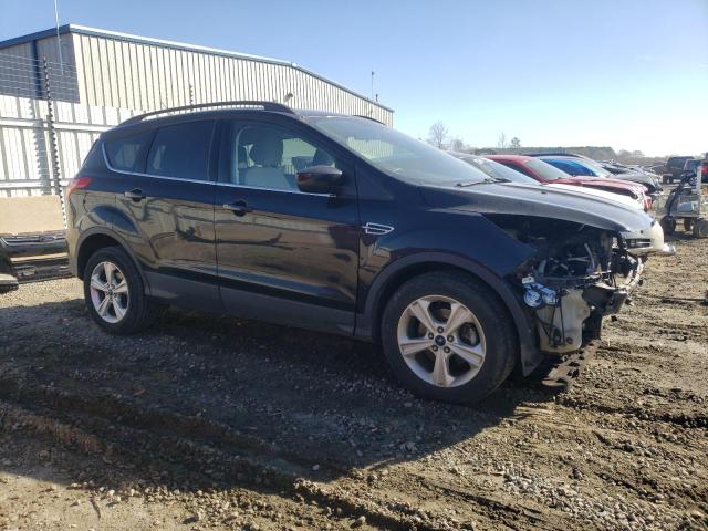 1FMCU0GX1FUC55077 - 2015 FORD ESCAPE SE BLACK photo 4