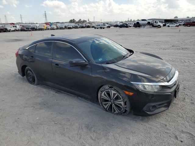 19XFC1F7XHE009304 - 2017 HONDA CIVIC EXL შავი ფოტო 4