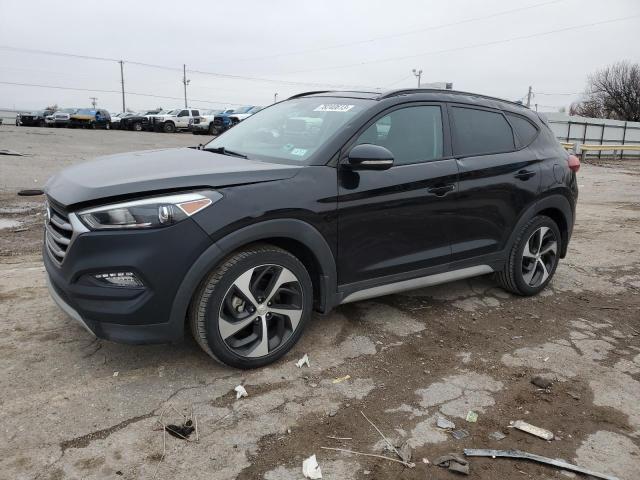 KM8J33A29JU715054 - 2018 HYUNDAI TUCSON VALUE BLACK photo 1