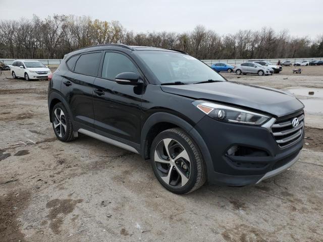 KM8J33A29JU715054 - 2018 HYUNDAI TUCSON VALUE BLACK photo 4