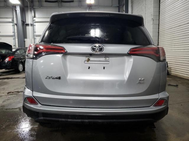 2T3BFREV2JW713432 - 2018 TOYOTA RAV4 LE SILVER photo 6