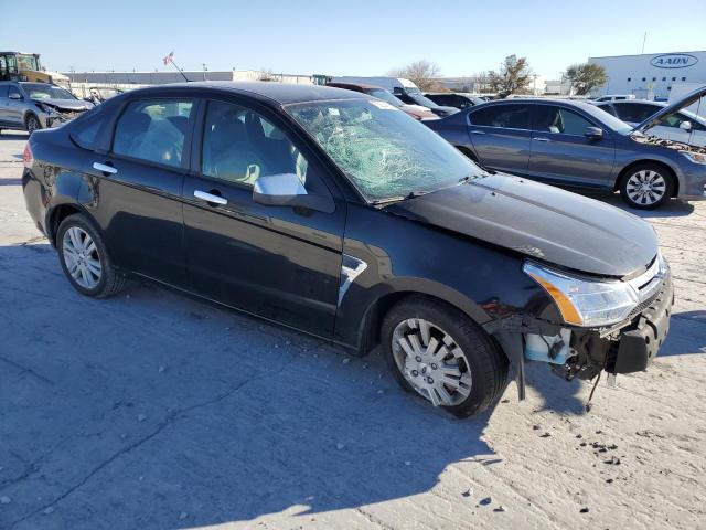 1FAHP37N79W105345 - 2009 FORD FOCUS SEL BLACK photo 4