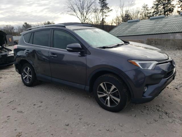 JTMRFREVXHJ125981 - 2017 TOYOTA RAV4 XLE GRAY photo 4