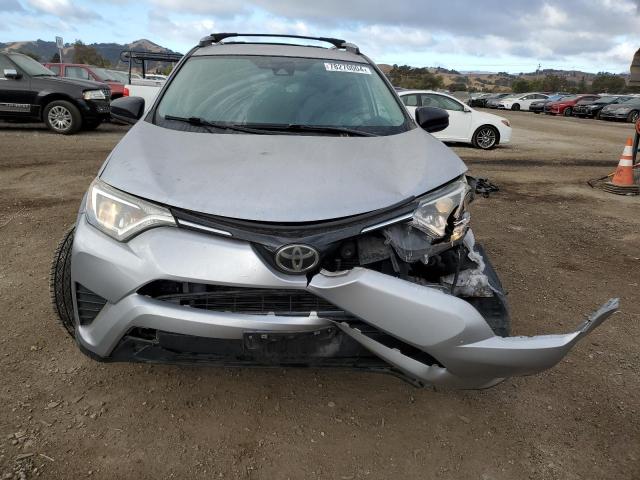 2T3ZFREV8HW337389 - 2017 TOYOTA RAV4 LE SILVER photo 5