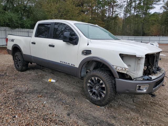 1N6BA1F45HN559724 - 2017 NISSAN TITAN XD SL WHITE photo 4