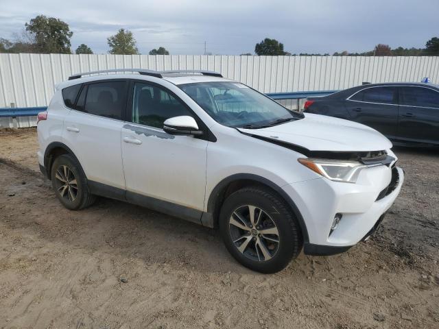 2T3RFREV4GW455986 - 2016 TOYOTA RAV4 XLE WHITE photo 4