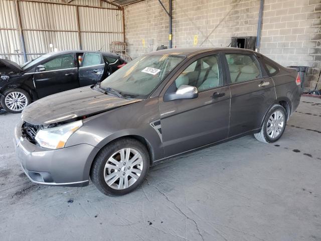 1FAHP37N29W201593 - 2009 FORD FOCUS SEL GRAY photo 1