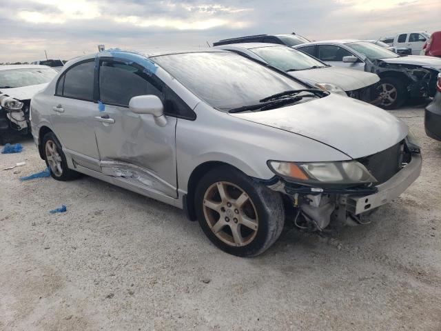 19XFA16559E020636 - 2009 HONDA CIVIC LX SILVER photo 4