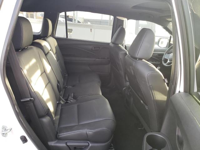 5FNYF8H54PB007996 - 2023 HONDA PASSPORT EXL WHITE photo 11