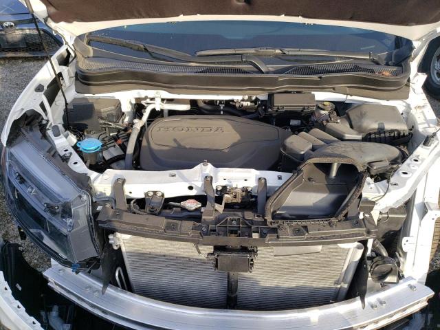 5FNYF8H54PB007996 - 2023 HONDA PASSPORT EXL WHITE photo 12