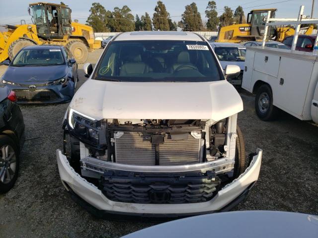 5FNYF8H54PB007996 - 2023 HONDA PASSPORT EXL WHITE photo 5