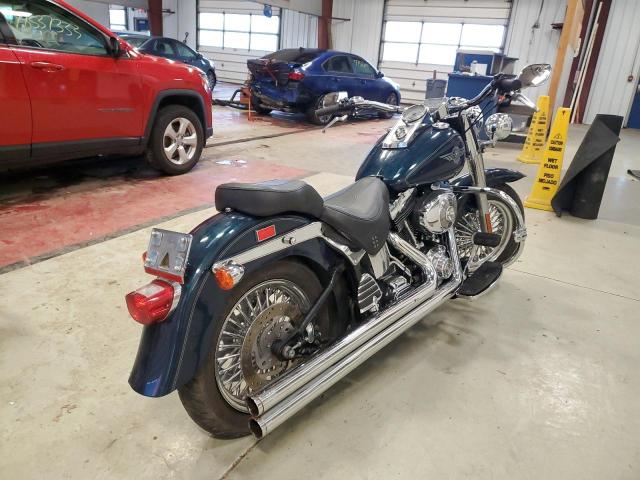 1HD1BXB112Y056593 - 2002 HARLEY-DAVIDSON FLSTFI BLUE photo 4