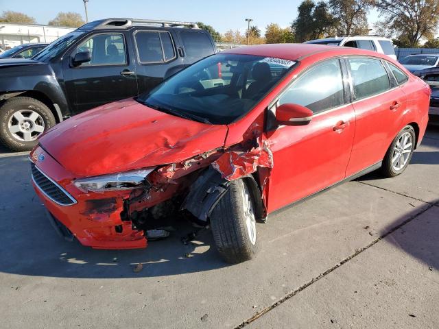 1FADP3F24FL289310 - 2015 FORD FOCUS SE RED photo 1