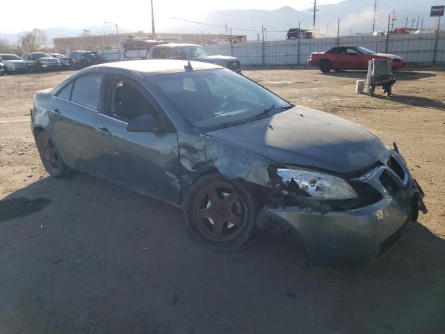 1G2ZG57B194214724 - 2009 PONTIAC G6 GREEN photo 4