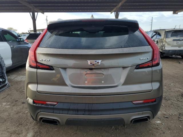 1GYFZCR41LF109909 - 2020 CADILLAC XT4 PREMIUM LUXURY BROWN photo 6