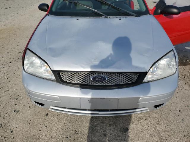 3FAFP31N45R130751 - 2005 FORD FOCUS ZX3 RED photo 11