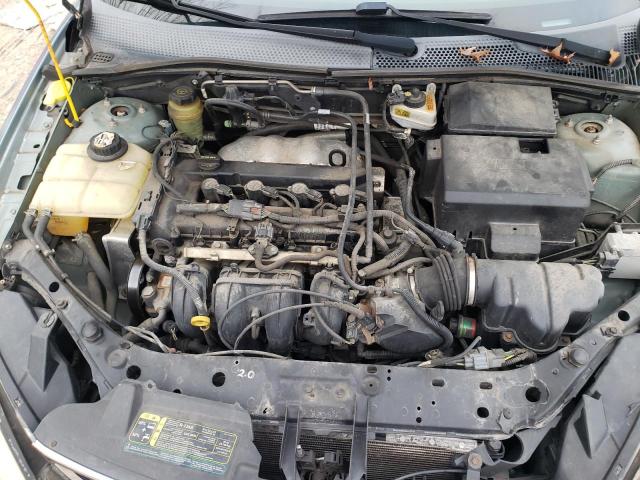 1FAFP34N35W186978 - 2005 FORD FOCUS ZX4 GREEN photo 11