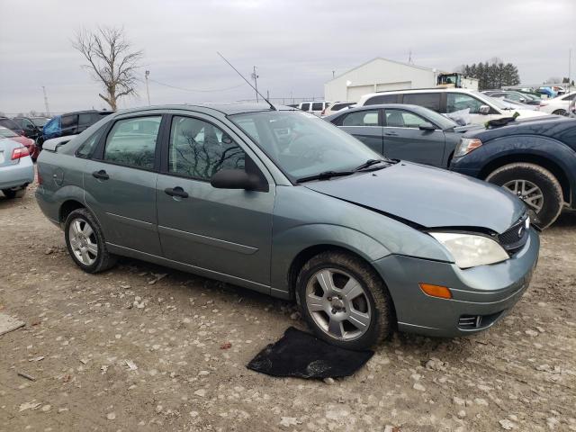 1FAFP34N35W186978 - 2005 FORD FOCUS ZX4 GREEN photo 4