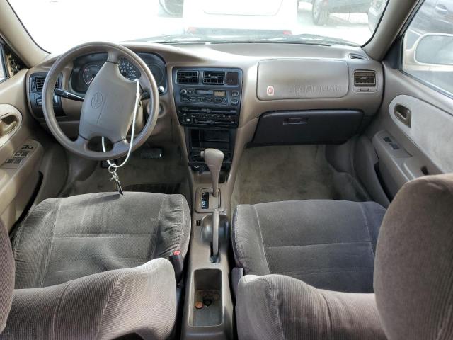 1NXBB02E9VZ565984 - 1997 TOYOTA COROLLA DX TAN photo 8