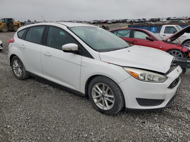 1FADP3K23FL328863 - 2015 FORD FOCUS SE WHITE photo 4