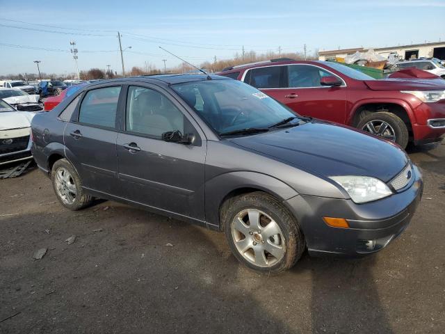 1FAFP38Z57W245481 - 2007 FORD FOCUS ST GRAY photo 4