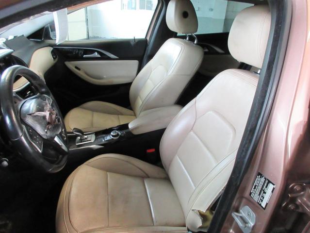 SJKCH5CR6HA023217 - 2017 INFINITI QX30 BASE TAN photo 9