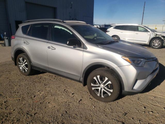 2T3BFREV6JW718343 - 2018 TOYOTA RAV4 LE SILVER photo 4