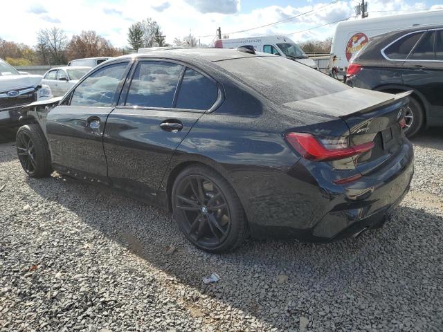 3MW5R7J06L8B39396 - 2020 BMW 330XI BLACK photo 2