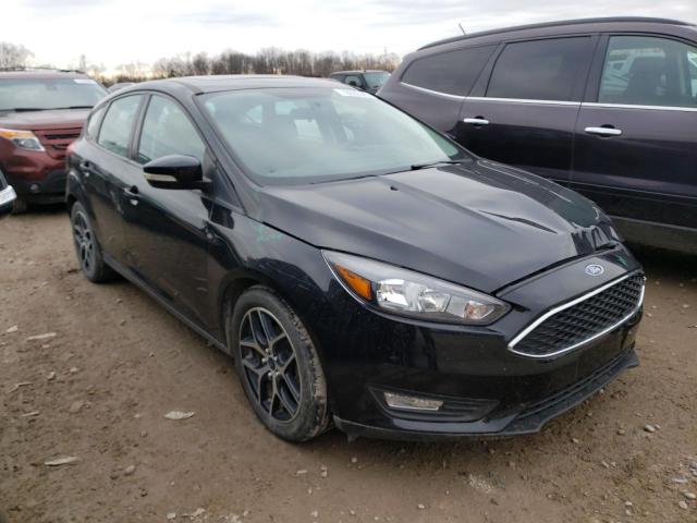 1FADP3M23JL294557 - 2018 FORD FOCUS SEL BLACK photo 4