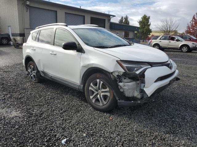 JTMBFREV9GJ069211 - 2016 TOYOTA RAV4 LE WHITE photo 4