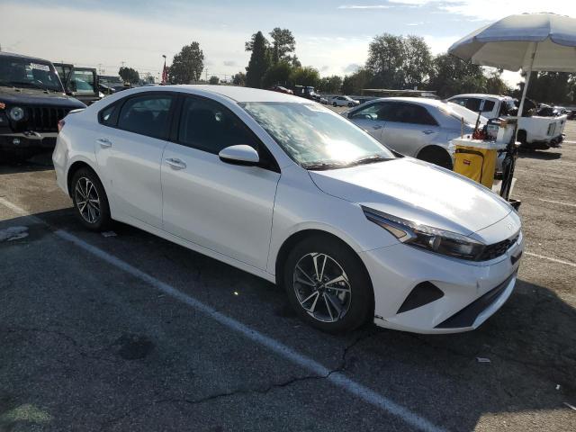 3KPF24AD0PE558784 - 2023 KIA FORTE LX WHITE photo 4