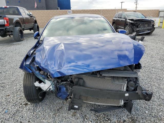 3KPF24AD3PE511572 - 2023 KIA FORTE LX BLUE photo 5