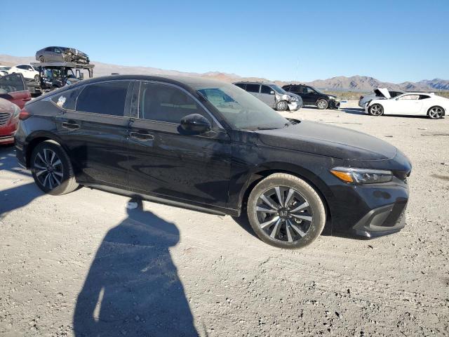 19XFL1H76PE010090 - 2023 HONDA CIVIC EXL შავი ფოტო 4