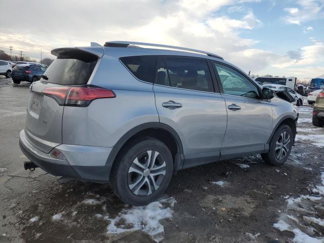 2T3ZFREV6GW263131 - 2016 TOYOTA RAV4 LE SILVER photo 3