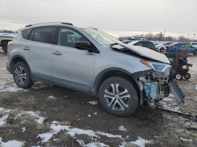 2T3ZFREV6GW263131 - 2016 TOYOTA RAV4 LE SILVER photo 4