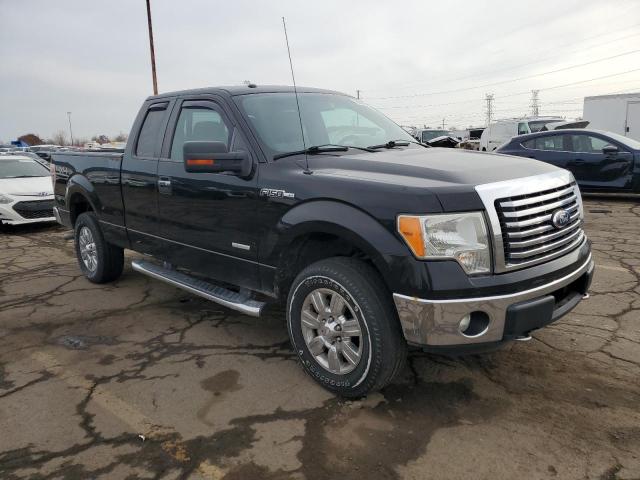 1FTFX1ET4BFC57564 - 2011 FORD F150 SUPER CAB BLACK photo 4