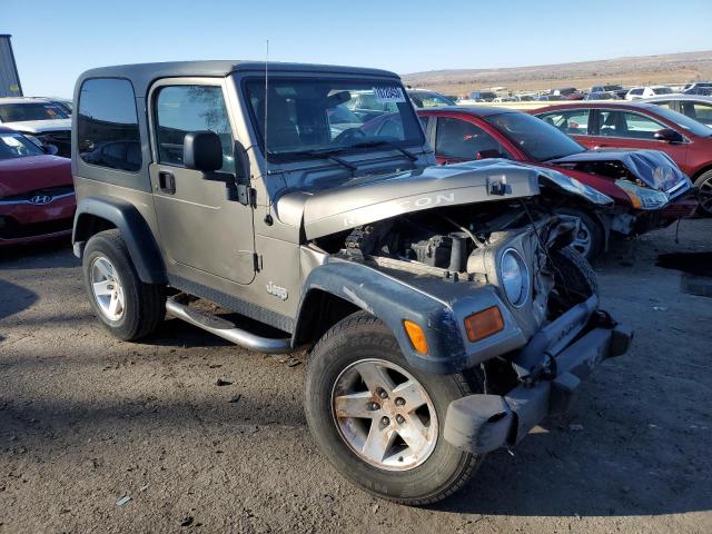 1J4FA69S54P742948 - 2004 JEEP WRANGLER / RUBICON GRAY photo 4