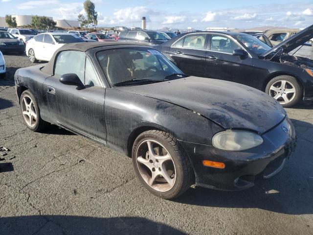 JM1NB353610207157 - 2001 MAZDA MX-5 MIATA BASE BLACK photo 4