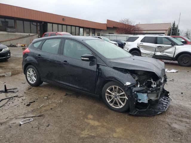 1FADP3K23HL278629 - 2017 FORD FOCUS SE BLACK photo 4