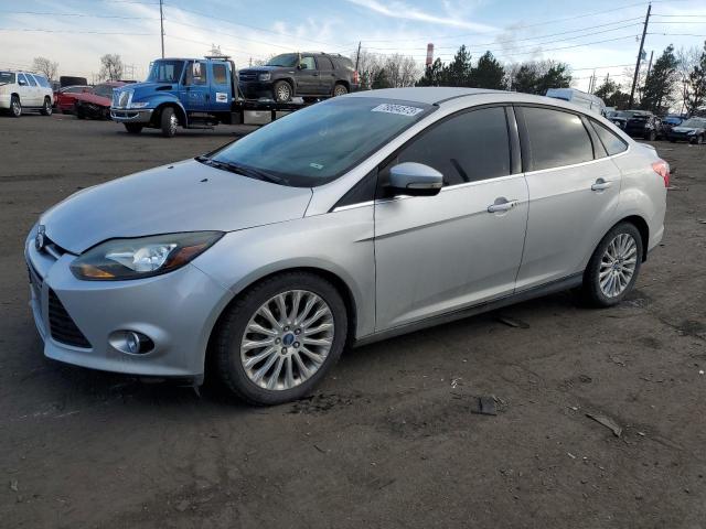 1FAHP3J28CL386157 - 2012 FORD FOCUS TITANIUM SILVER photo 1